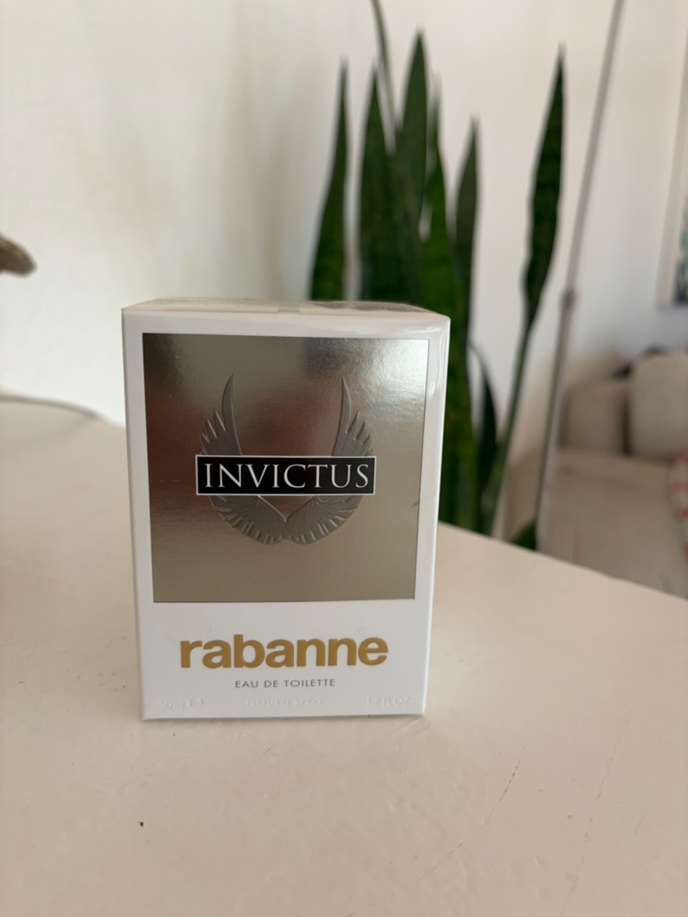 Paco Rabanne Invictus Eau de Toilette - White & Silver with Gold Logo